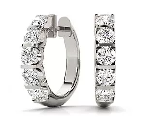 Channel Set Huggie Earrings 1 /4 Carat Total Weight
